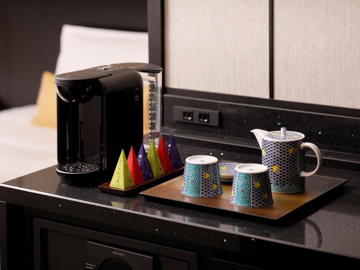 The Hotel Sanraku Kanazawa 21Th December 2022 Open Exteriör bild A Nespresso coffee machine in a hotel room